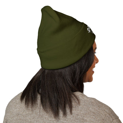 Side view of the embroidered cuffed beanie, Olive, worn